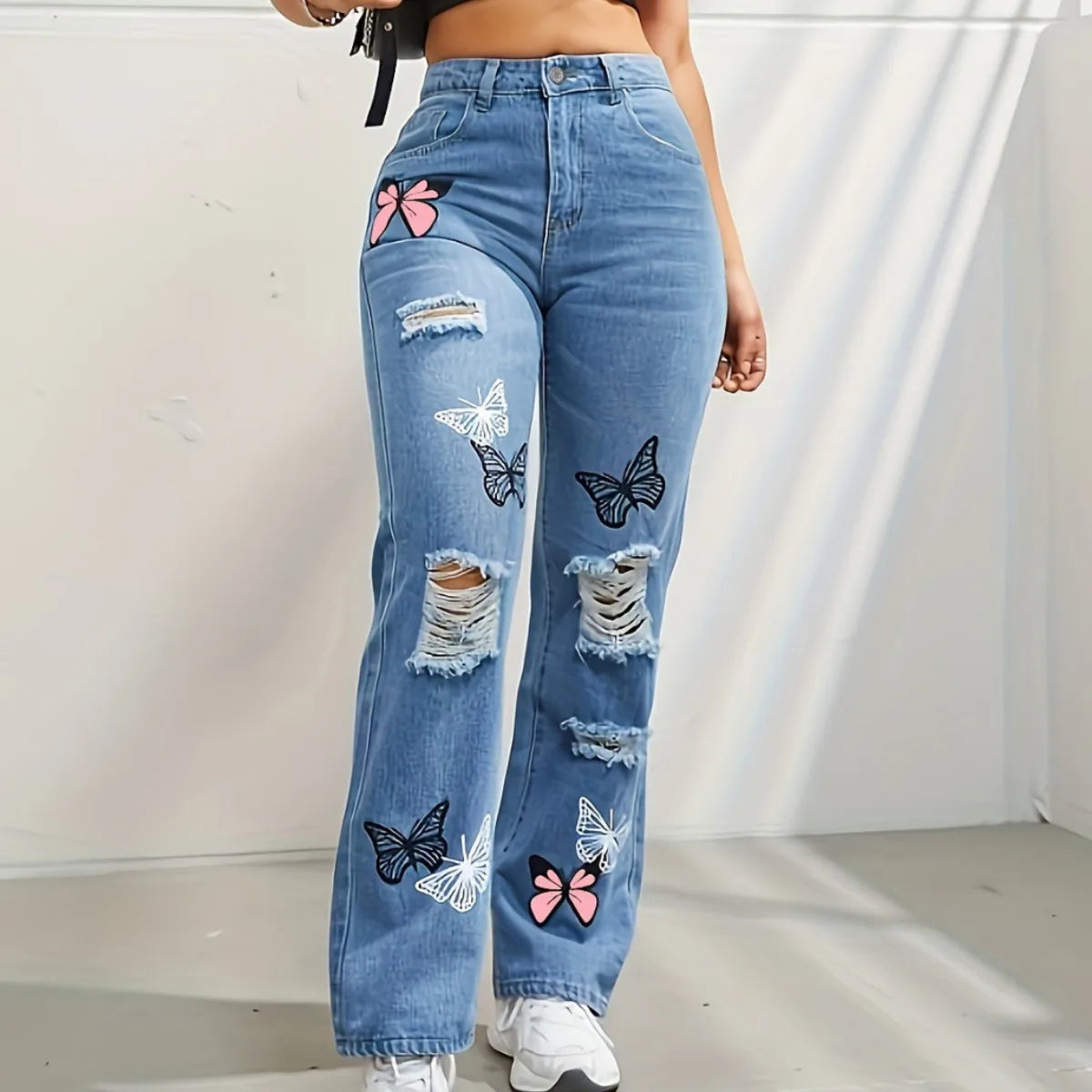 Jean papillon taille haute pour Femme